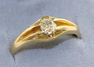 Lot 619 - A diamond solitaire ring, an old cut diamond in a claw setting, to forked shoulders, estimated...