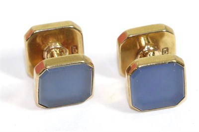 Lot 636 - A pair of chalcedony set cufflinks, octagonal blue chalcedony plaques in rubbed over settings,...