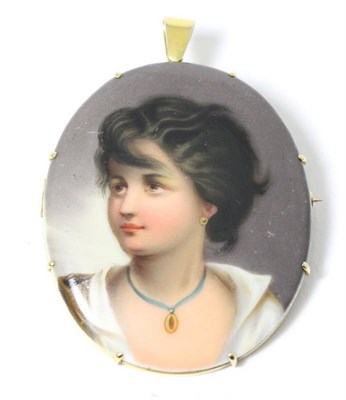 Lot 644 - A porcelain oval plaque, painted with the bust of a lady wearing a pendant on a blue ribbon with an