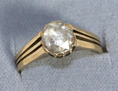 Lot 647 - A rose cut diamond solitaire ring, in a closed back collet setting, to forked shoulders, finger...