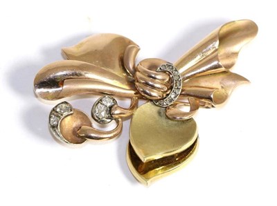 Lot 667 - A two colour diamond brooch, a bow motif with two heart shapes and set with old cut and rose...