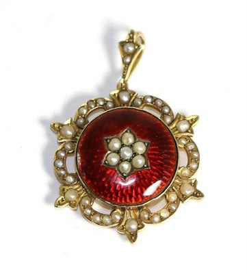 Lot 703 - An enamel and seed pearl pendant, a cluster of seed pearls to a circular red enamel pendant, with a