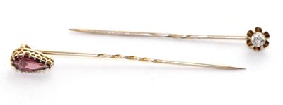 Lot 706 - An old cut diamond stick pin, estimated diamond weight 0.20 and a garnet stick pin (2)