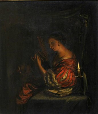 Lot 1206 - Manner of Godfried Schalcken (1643-1706) Dutch, Lady with a guitar by candlelight, with red wax...