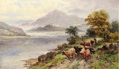 Lot 1227 - William Langley (1852-1922) A drover and highland cattle beside a loch in a mountainous...