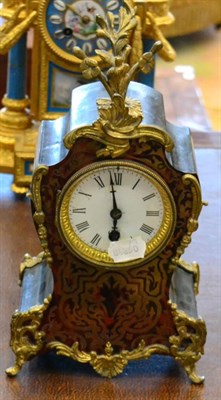 Lot 1301 - A 19th century Boulle case mantel timepiece, case of cartouche form with floral finial and...