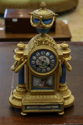 Lot 1302 - A French gilt metal mantel clock, late 19th century of architectural form set with sevres style...