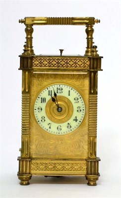 Lot 1304 - A brass striking and repeating carriage clock, circa 1900, carrying handle and repeat button,...