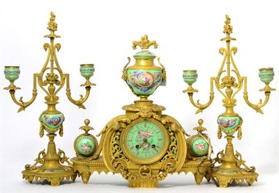 Lot 1306 - A gilt metal and porcelain mounted striking mantel clock garniture, signed Achille Brocot,...