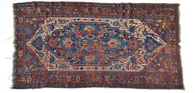 Lot 1334 - 19th century Khamseh rug, South West Iran, the ivory field centred by an indigo floral panel framed