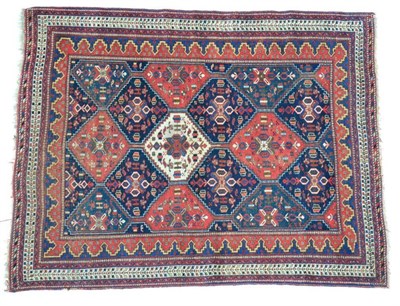 Lot 1349 - Afshar rug, South East Iran, the polychrome stepped lattice field containing tribal devices...