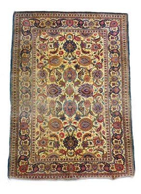 Lot 1365 - Kashan rug, central Iran, the ivory field with palmettes and floral serrated leafy vines...