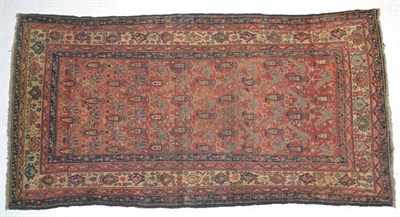 Lot 1371 - Malayir Keelleh, West Iran, circa 1910, the madder field with rows of boteh enclosed by cream...