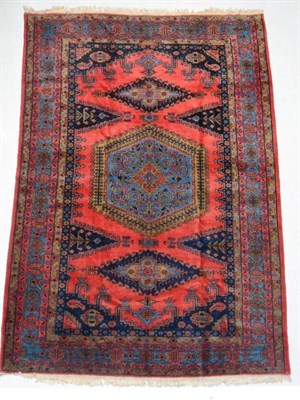 Lot 1387 - Viss carpet, North West Iran, the terracotta field with typical medallion framed by spandrels...