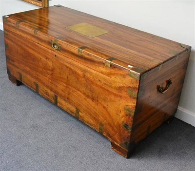 Lot 1399 - A 19th century camphor wood and brass bound trunk of large proportions, hinged lid and carrying...