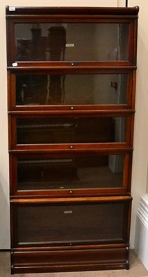 Lot 1439 - A Globe-Wernicke Co & Lts five sectional mahogany bookcase, with pivoting glazed doors, 185cm high