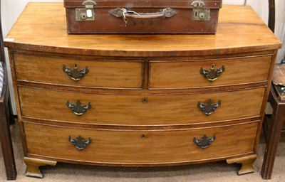 Lot 1452 - ^ A mahogany bow fronted chest of two short over two long drawers, raised on bracket feet,...