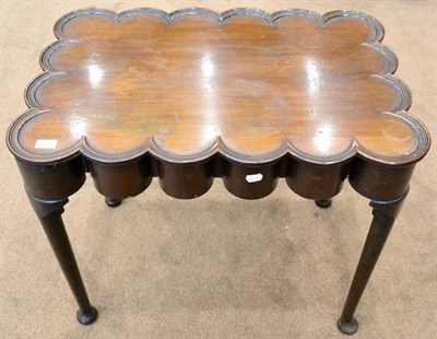 Lot 1459 - ^ A Queen Anne style mahogany side table, the moulded top above a long frieze drawer, raised on...