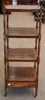 Lot 1463 - A Regency mahogany four tier whatnot, raised on spindle turned legs, the base fitted a single...