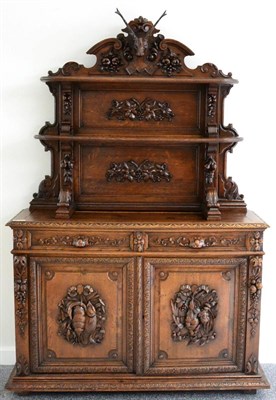 Lot 1468 - An impressive Victorian carved oak sideboard, decorated with dead game, superstructure with two...