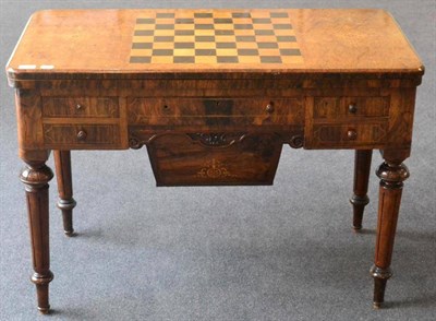 Lot 1469 - A Victorian burr walnut chest top games tea table, circa 1870, with five small drawers with sliding