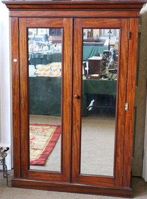 Lot 1478 - A Victorian mahogany double door wardrobe, circa 1870, with mirror doors enclosing hanging...