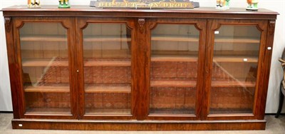 Lot 1480 - A Victorian mahogany four door bookcase with moulded top above glazed doors enclosing six...