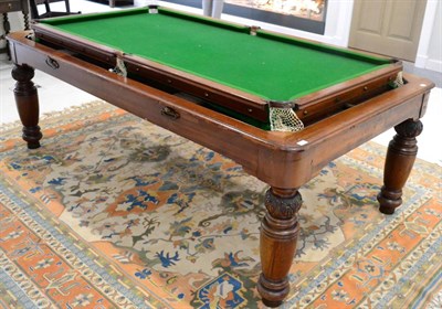 Lot 1484 - A Victorian mahogany snooker table, circa 1860, with rotating top, brass drop handles within...