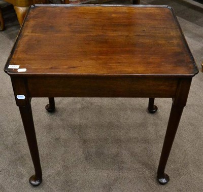 Lot 1492 - An 18th century mahogany side table with re-entering corners, raised on tapering legs and pad feet