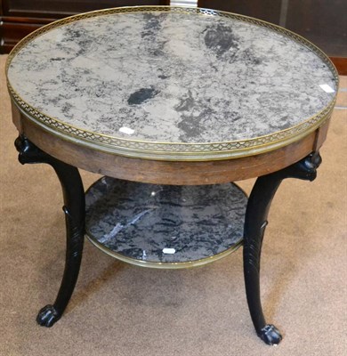 Lot 1499 - A 19th century mahogany brass mounted two tier centre table, with grey marble top, raised...