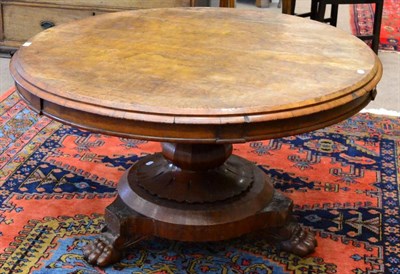 Lot 1503 - ^ A Victorian circular mahogany dining table, mid 19th century, raised on a tapering support,...