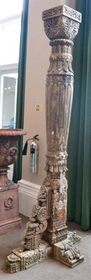 Lot 1520 - A pair of impressive carved teak wooden columns, probably 19th century, raised on crucifix...