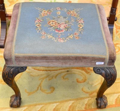 Lot 1523 - ^ A 19th century carved mahogany dressing stool in the George II style, upholstered in pink...