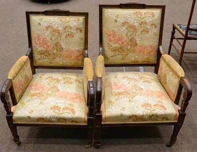 Lot 1529 - A pair of Rosewood framed open armchairs with chinoiserie design fabric, with padded back...