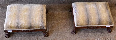 Lot 1531 - A pair of Victorian carved mahogany footstools, later recovered in plush velvet, raised on...