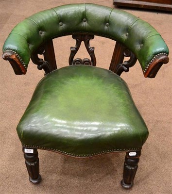 Lot 1537 - A Victorian mahogany armchair, mid-19th century, recovered in close nailed green leather with...