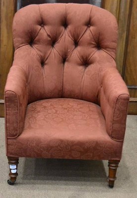 Lot 1545 - Victorian armchair, circa 1870, recovered in orange floral fabric with button back and sides...