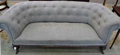 Lot 1550 - A Victorian Chesterfield sofa, recovered in grey button back corduroy with rounded arms and...