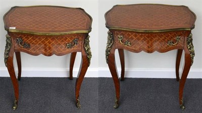 Lot 1551 - A pair of Louis XIV style thuyawood parquetry decorated and gilt metal mounted side tables,...