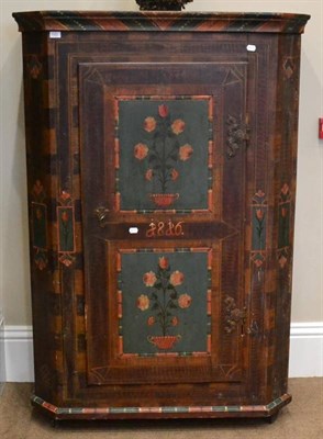 Lot 1552 - A 19th century Austrian polychrome painted cupboard decorated with flowers and dated 1816, interior