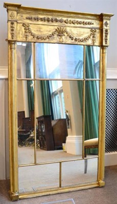 Lot 1560 - A 19th century gilt and gesso over mantel mirror, with rectangular marginal plates between...