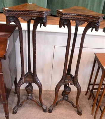 Lot 1570 - A pair of carved mahogany torcheres in Adam style, labelled Edwards & Roberts, with acanthus carved