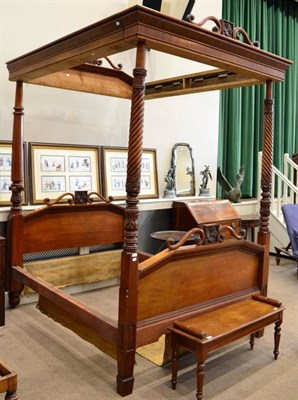 Lot 1573 - A Victorian carved mahogany four poster bed with spiral and plain turned posts with conforming foot