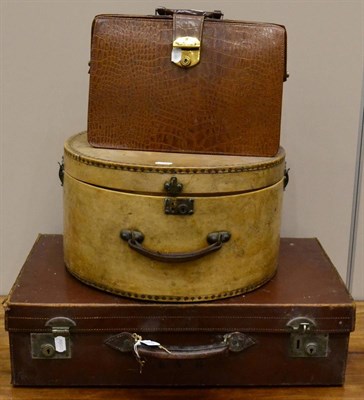 Lot 1577 - ^ A vintage brown leather briefcase, brown leather suitcase stamped with initials 'KVB',...