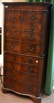 Lot 1605 - ^ A Chippendale style mahogany serpentine fronted chest, early 20th century, of two sort and...