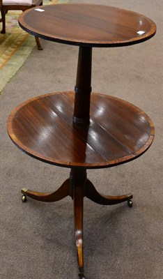 Lot 1606 - A George III mahogany and satinwood banded two-tier dumb waiter, early 19th century, with...