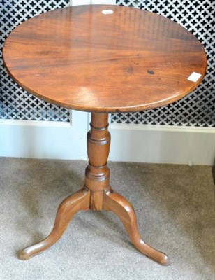 Lot 1608 - A George III style mahogany piecrust edge tripod table, late 19th century, with the flip top raised