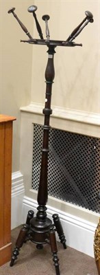 Lot 1617 - Mahogany spindle turned hat and coat stand, early 20th century, circular top with five arms...