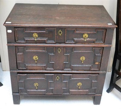 Lot 1646 - A late 17th century geometric moulded oak three drawer chest, 83cm wide