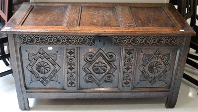 Lot 1647 - A late 17th century joined oak chest, the hinged lid above a guilloche carve frieze with three...